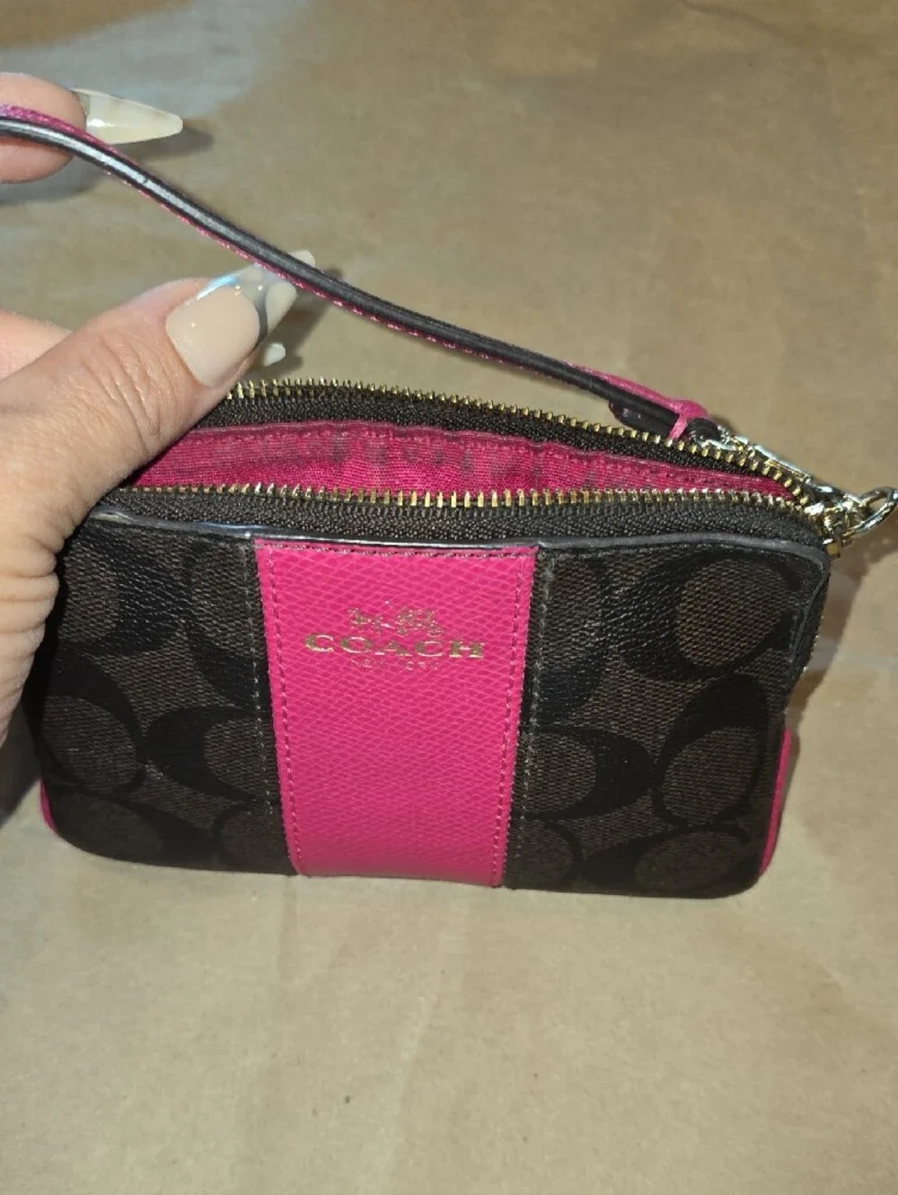 Coach Signature Canvas Wristlet Phone Case in Pink and Brown